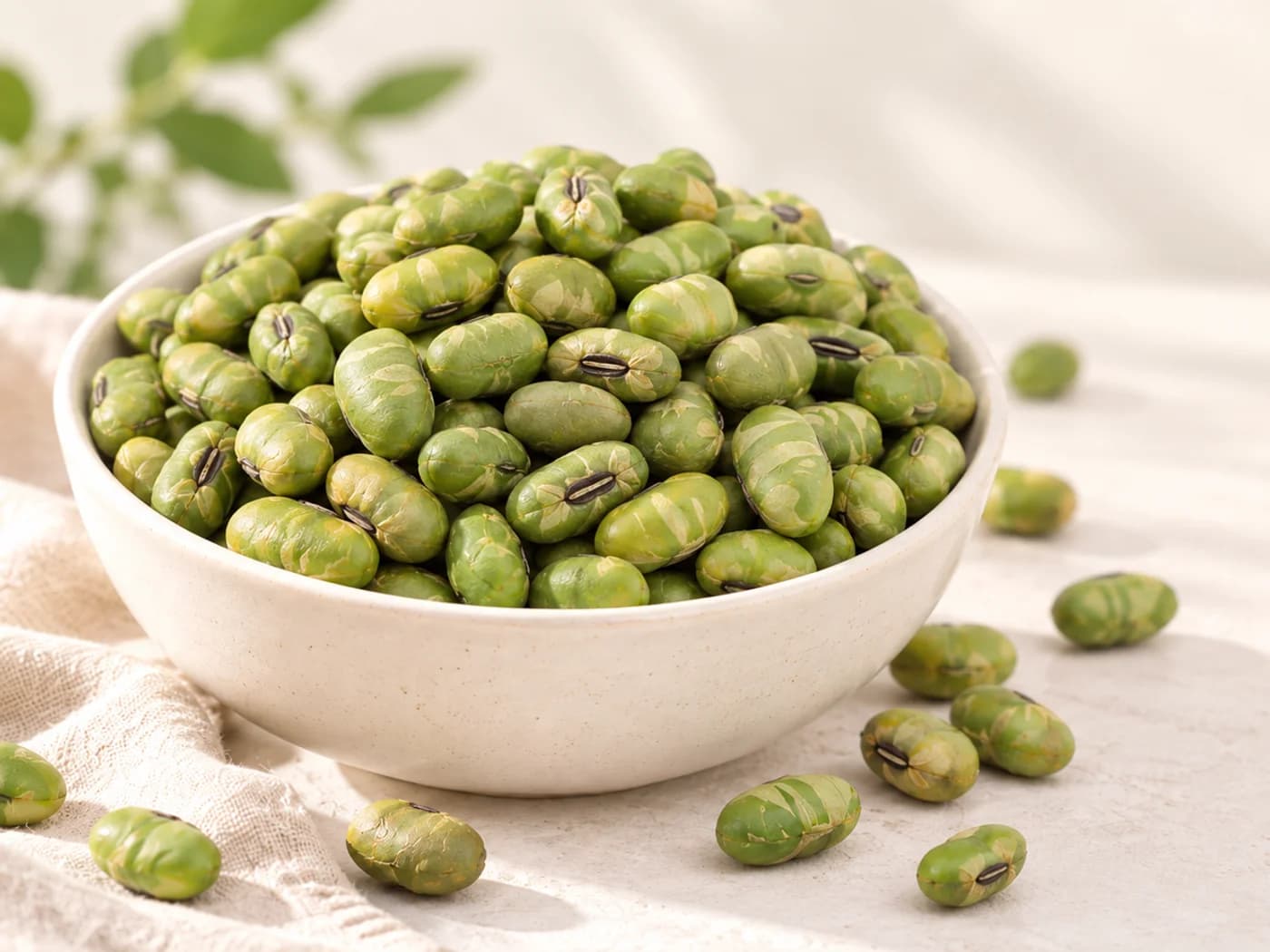 Roasted edamame beans served in a ceramic bowl